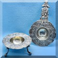 S34. Sterling silver tea strainer. 